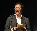 Charles Phu of the Office for Architectural Culture announcing the winner of Outstanding Male Performance - Classical - Zdenek Konvalina - English National Ballet